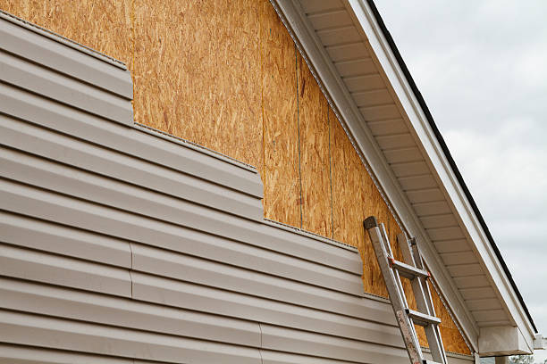 Professional Vinyl Siding technician working in Julian, PA
